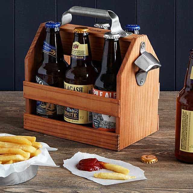 A wooden beer holder with an opener