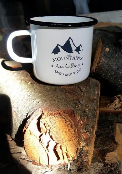 The mountains are calling and I must go enamel mug